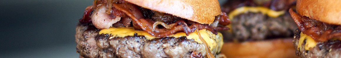 Eating Burger at Andy's No 4 Burgers restaurant in Indio, CA.